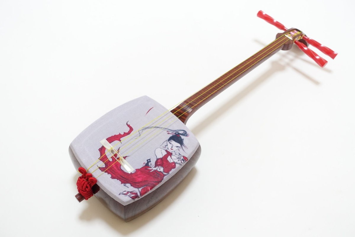 Народный инструмент Японии сямисэн