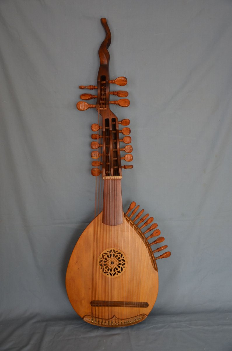 Торбан музыкальный инструмент